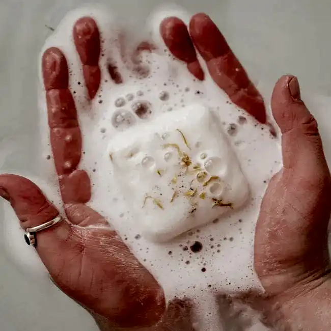 Hands holding bath bomb
