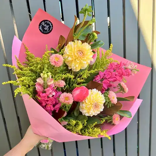 pink orange and yellow flowers in a bouquet