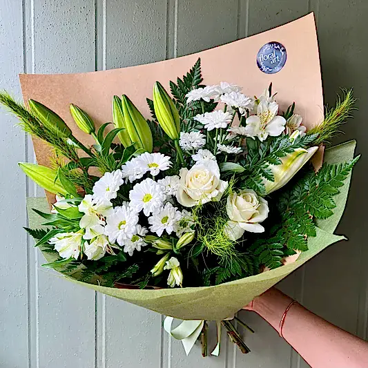 green and white flower sympathy bouquet 